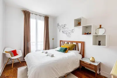 Un ou plusieurs lits dans un hébergement de l'établissement GuestReady - Elegance in trasbourg-Saint-Denis