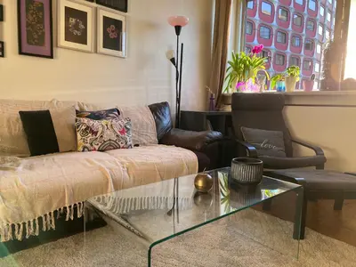 Coin salon dans l'établissement Tour Reflet Paris 15, A cozy and welcoming home, just like your own
