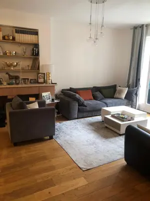 Coin salon dans l'établissement Beautiful 3 bdr apartment with garden close to Champs-Elysées