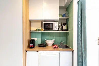 Cuisine ou kitchenette dans l'établissement GuestReady - Bel Apt. au cœur de Paris