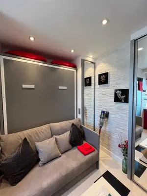 Télévision ou salle de divertissement dans l'établissement JOIA PARIS - Montparnasse