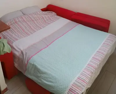Un ou plusieurs lits dans un hébergement de l'établissement Cosy studio Bastille