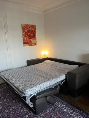 Un ou plusieurs lits dans un hébergement de l'établissement Montmartre belle vue