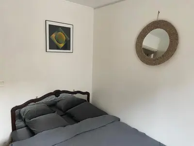 Un ou plusieurs lits dans un hébergement de l'établissement Cosy 45m2 private apartment Paris Montparnasse