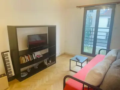 Coin salon dans l'établissement Cosy 45m2 private apartment Paris Montparnasse