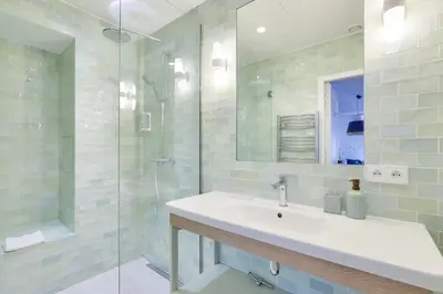 Salle de bains dans l'établissement Charmant Appartement avec Climatisation - Paris 3