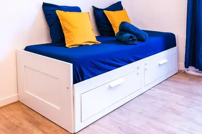 Un ou plusieurs lits dans un hébergement de l'établissement Cosy Beautiful Studio Heart of Paris Saint-Germain des Prés