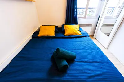 Un ou plusieurs lits dans un hébergement de l'établissement Cosy Beautiful Studio Heart of Paris Saint-Germain des Prés