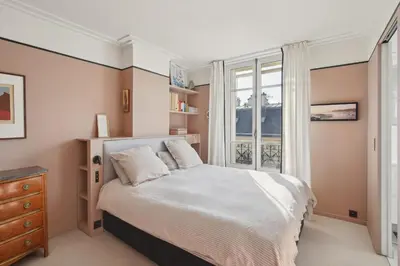 Un ou plusieurs lits dans un hébergement de l'établissement Chaillot - Lübeck II 2 ch by B'Your Home