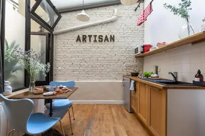 Cuisine ou kitchenette dans l'établissement Artisan Lofts near Marais
