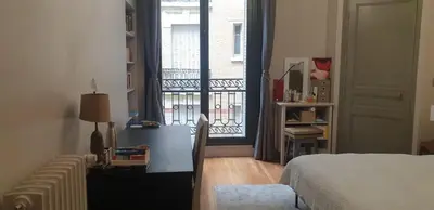 Un ou plusieurs lits dans un hébergement de l'établissement Appartement de standing