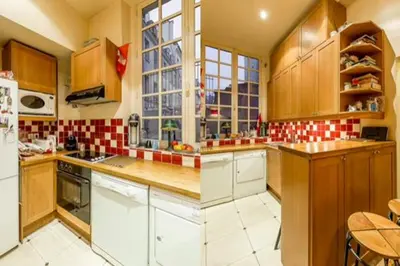 Cuisine ou kitchenette dans l'établissement The arts apartment - spacious - Invalides by Mon Petit Faré