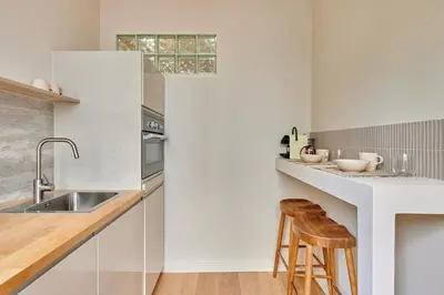 Cuisine ou kitchenette dans l'établissement Studio Center of Paris Beaubourg by Studioprestige