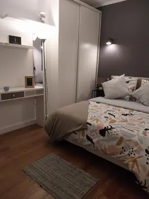 Un ou plusieurs lits dans un hébergement de l'établissement Appartement cosy dans le marais
