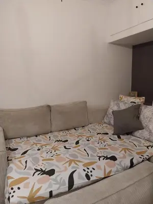 Un ou plusieurs lits dans un hébergement de l'établissement Appartement cosy dans le marais