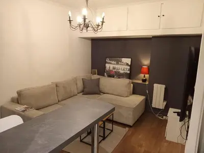 Coin salon dans l'établissement Appartement cosy dans le marais