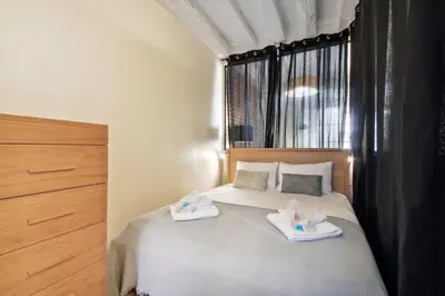 Un ou plusieurs lits dans un hébergement de l'établissement 256 Suite Rosiers - Superb apartment in Paris.