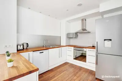 Cuisine ou kitchenette dans l'établissement Charming home Convention Serres