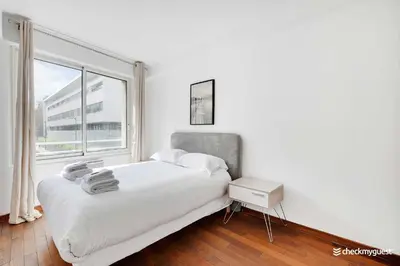 Un ou plusieurs lits dans un hébergement de l'établissement Charming home Convention Serres