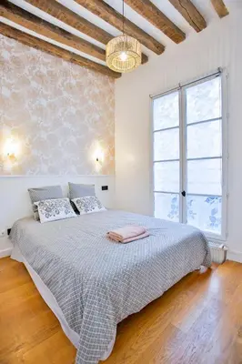 Un ou plusieurs lits dans un hébergement de l'établissement Marais 4 bedrooms new apartment