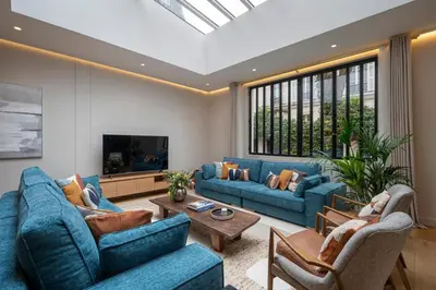 Télévision ou salle de divertissement dans l'établissement La Villa Ballu