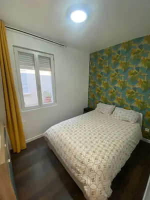 Un ou plusieurs lits dans un hébergement de l'établissement Agréable appartement in Montmartre