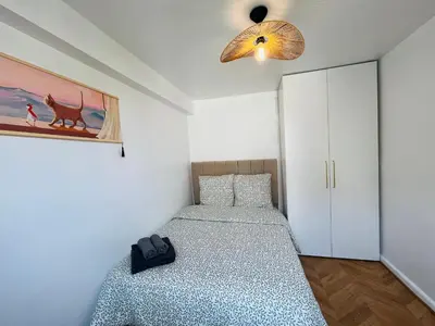 Un ou plusieurs lits dans un hébergement de l'établissement Apart super 150m de Centre Pompidou