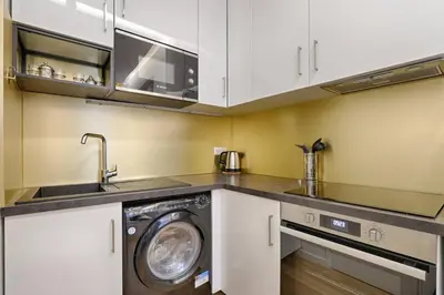 Cuisine ou kitchenette dans l'établissement Beau studio 2P en plein cœur du 2e