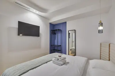 Un ou plusieurs lits dans un hébergement de l'établissement Résidence Saint Germain des Près Rue de Rennes by Studioprestige