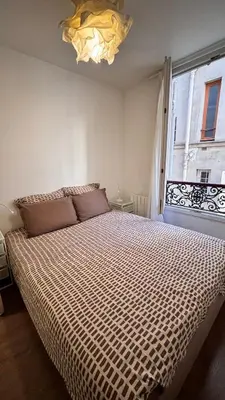 Un ou plusieurs lits dans un hébergement de l'établissement Charming apartment in Monmartre