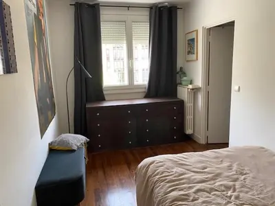 Un ou plusieurs lits dans un hébergement de l'établissement Appartement design