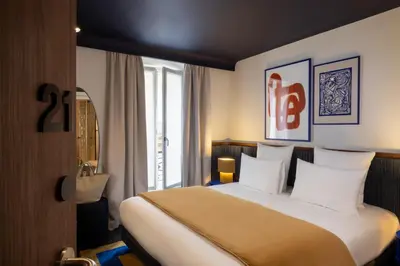 Un ou plusieurs lits dans un hébergement de l'établissement Hôtel Gabbie