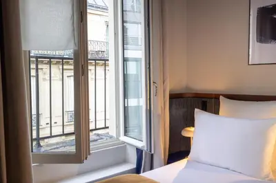 Un ou plusieurs lits dans un hébergement de l'établissement Hôtel Gabbie