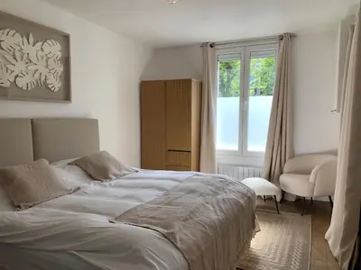 Un ou plusieurs lits dans un hébergement de l'établissement Les Suites de Vanves - Parc des expositions Porte de Versailles