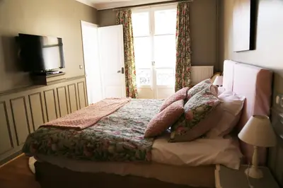 Un ou plusieurs lits dans un hébergement de l'établissement Les Suites de Vanves - Parc des expositions Porte de Versailles