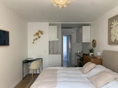 Un ou plusieurs lits dans un hébergement de l'établissement Les Suites de Vanves - Parc des expositions Porte de Versailles
