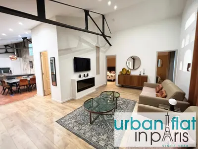 Télévision ou salle de divertissement dans l'établissement Urban Flat 161 - Sublime 4BDR Luxury Flat in Paris
