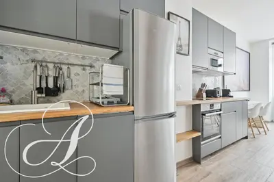 Cuisine ou kitchenette dans l'établissement Roxane, 2 chambres dont une en souplex Paris 14e