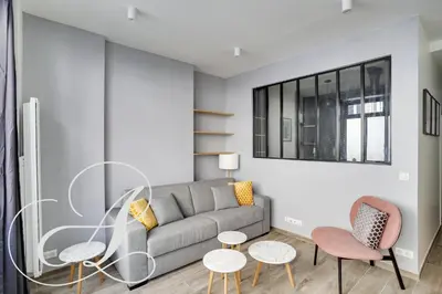 Coin salon dans l'établissement Cyrano, Appartement moderne 2 chambres Paris 14eme
