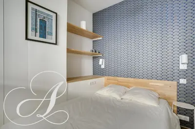 Un ou plusieurs lits dans un hébergement de l'établissement Cyrano, Appartement moderne 2 chambres Paris 14eme