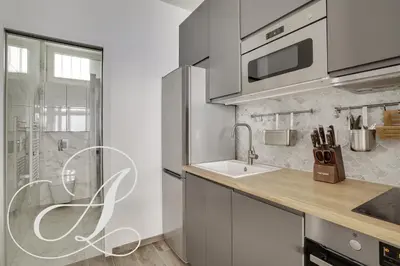 Cuisine ou kitchenette dans l'établissement Cyrano, Appartement moderne 2 chambres Paris 14eme