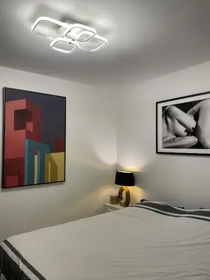 Un ou plusieurs lits dans un hébergement de l'établissement Chambre suite privée à Boulogne