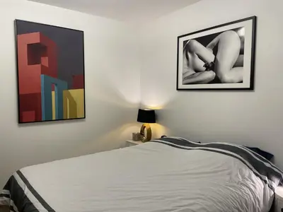 Un ou plusieurs lits dans un hébergement de l'établissement Chambre suite privée à Boulogne