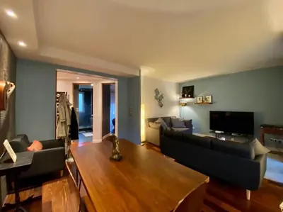 Télévision ou salle de divertissement dans l'établissement Appartement moderne Neuilly sur Seine au calme