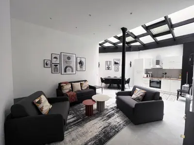 Coin salon dans l'établissement Urban Flat 08 - The Panoramic Flat in Paris