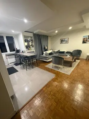 Coin salon dans l'établissement appartement 65m