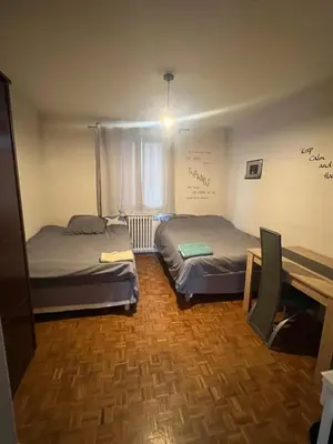 Un ou plusieurs lits dans un hébergement de l'établissement appartement 65m