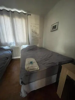 Un ou plusieurs lits dans un hébergement de l'établissement appartement 65m