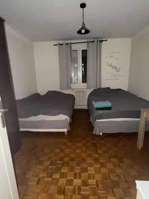 Un ou plusieurs lits dans un hébergement de l'établissement appartement 65m