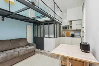 Cuisine ou kitchenette dans l'établissement Atypique Loft 3 personnes with AC by Weekome